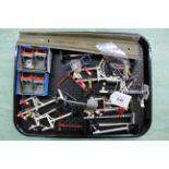 A small tray of Hornby and Crescent train accessories including buffers,