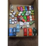 A selection of vintage die cast cars, mainly VW Beetles,