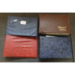 Seven mixed GB and world stamp albums together with four postcard stamp albums