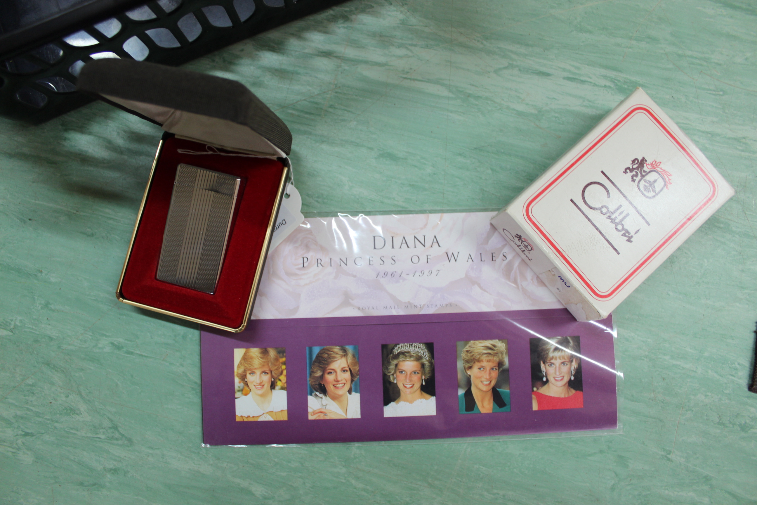 Two boxed Colibri lighters plus a Royal Mail set of Princess Diana stamps