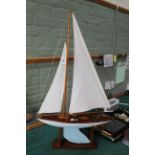 A 'Bowman' racing yacht, wood construction with metal keel and linen sails,