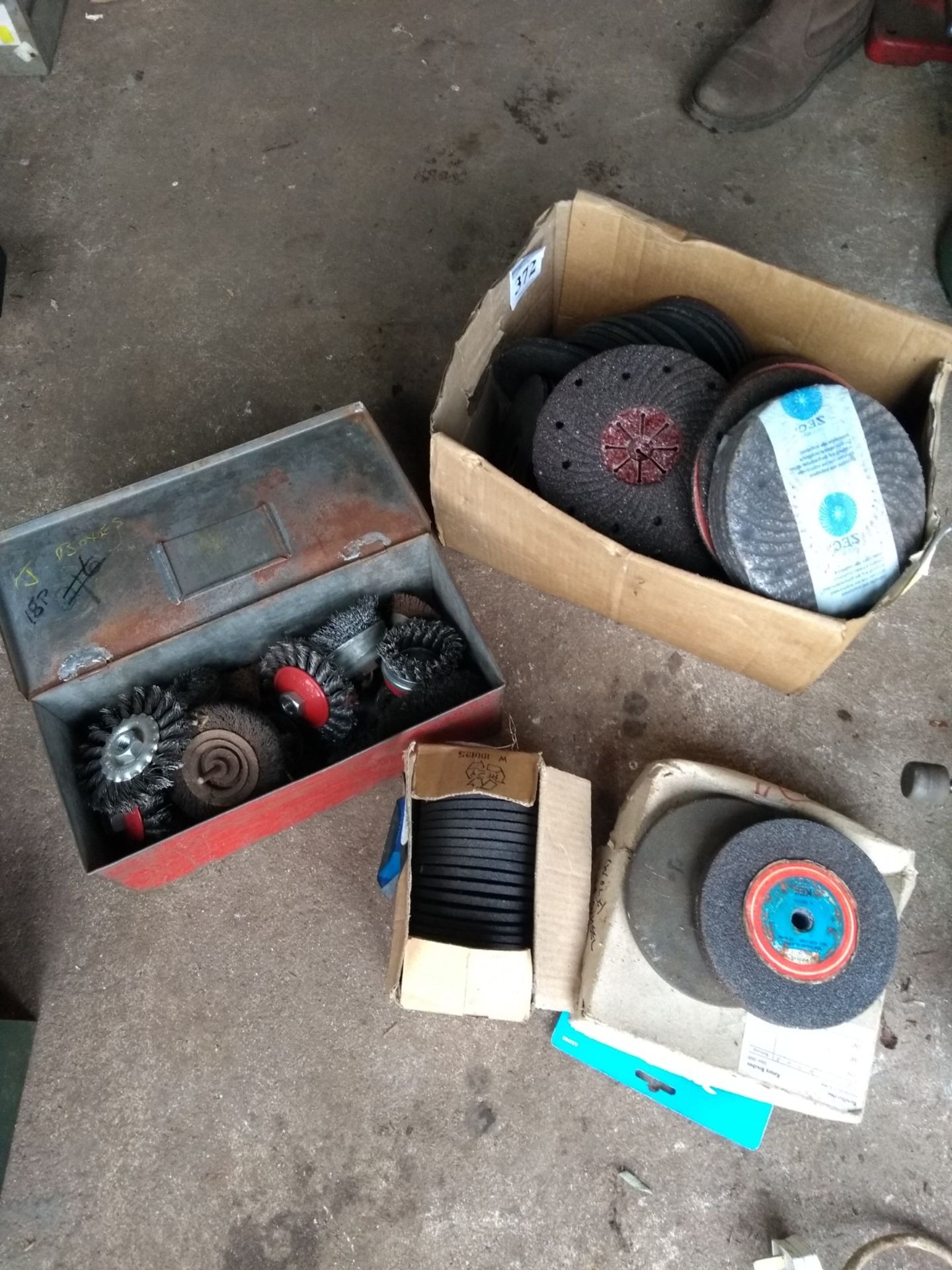 Quantity of Disc grinding wheels and rotary wire brushes. Stored near Gorleston, Norfolk.