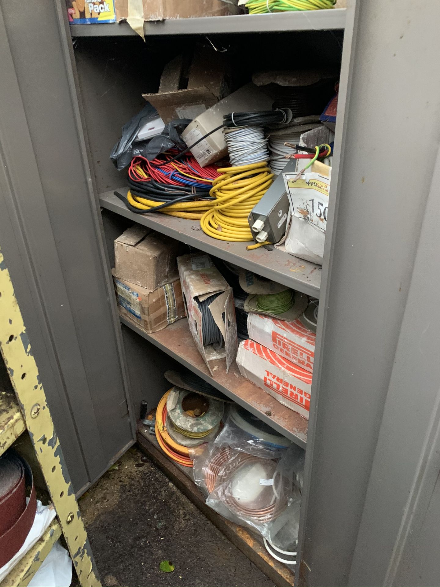 Quanity of Electrical wire reels and assorted wire - cabinet not included.