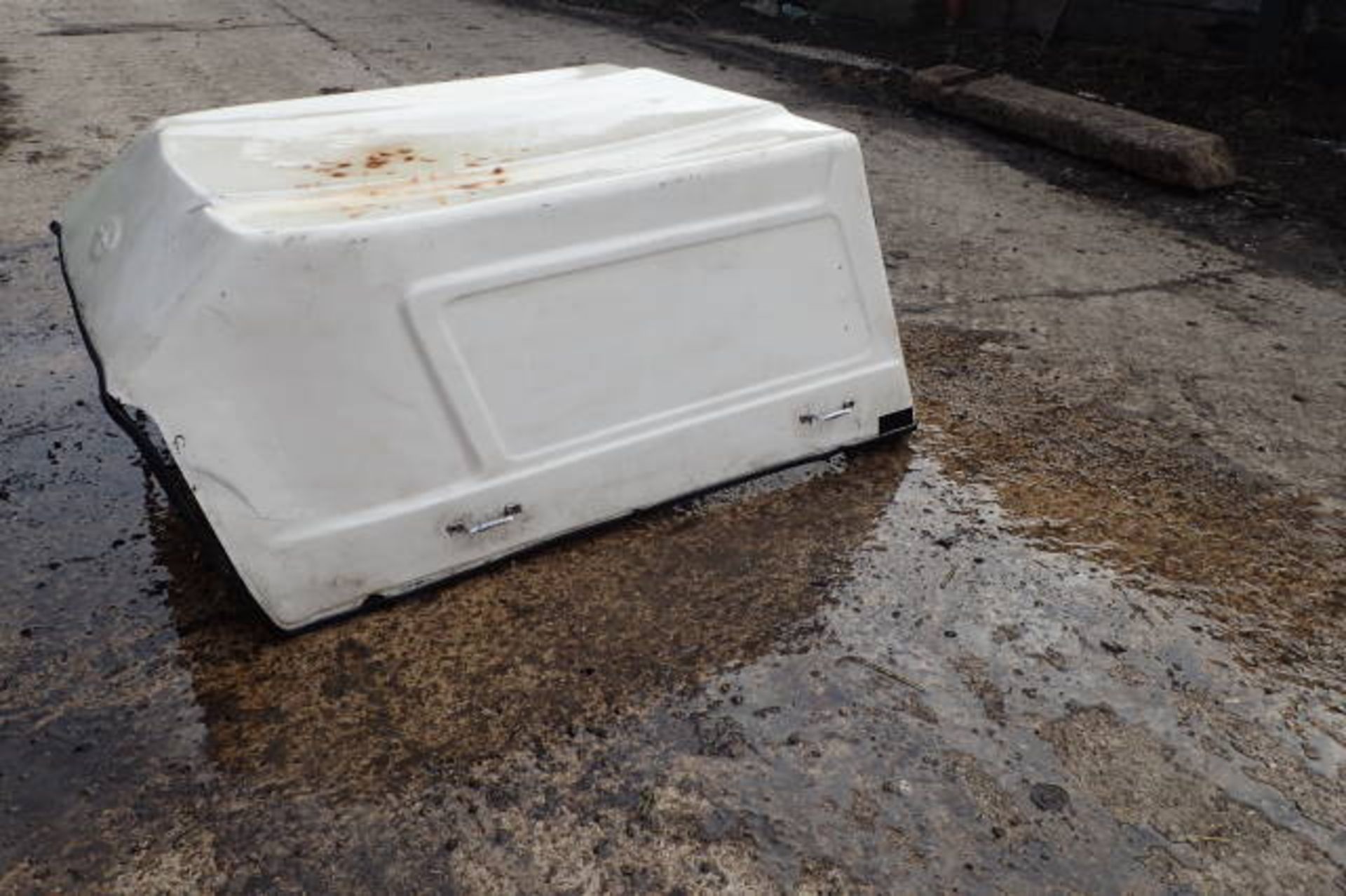 Fibreglass Canopy for a pickup. The canopy is off a unknown vehicle.