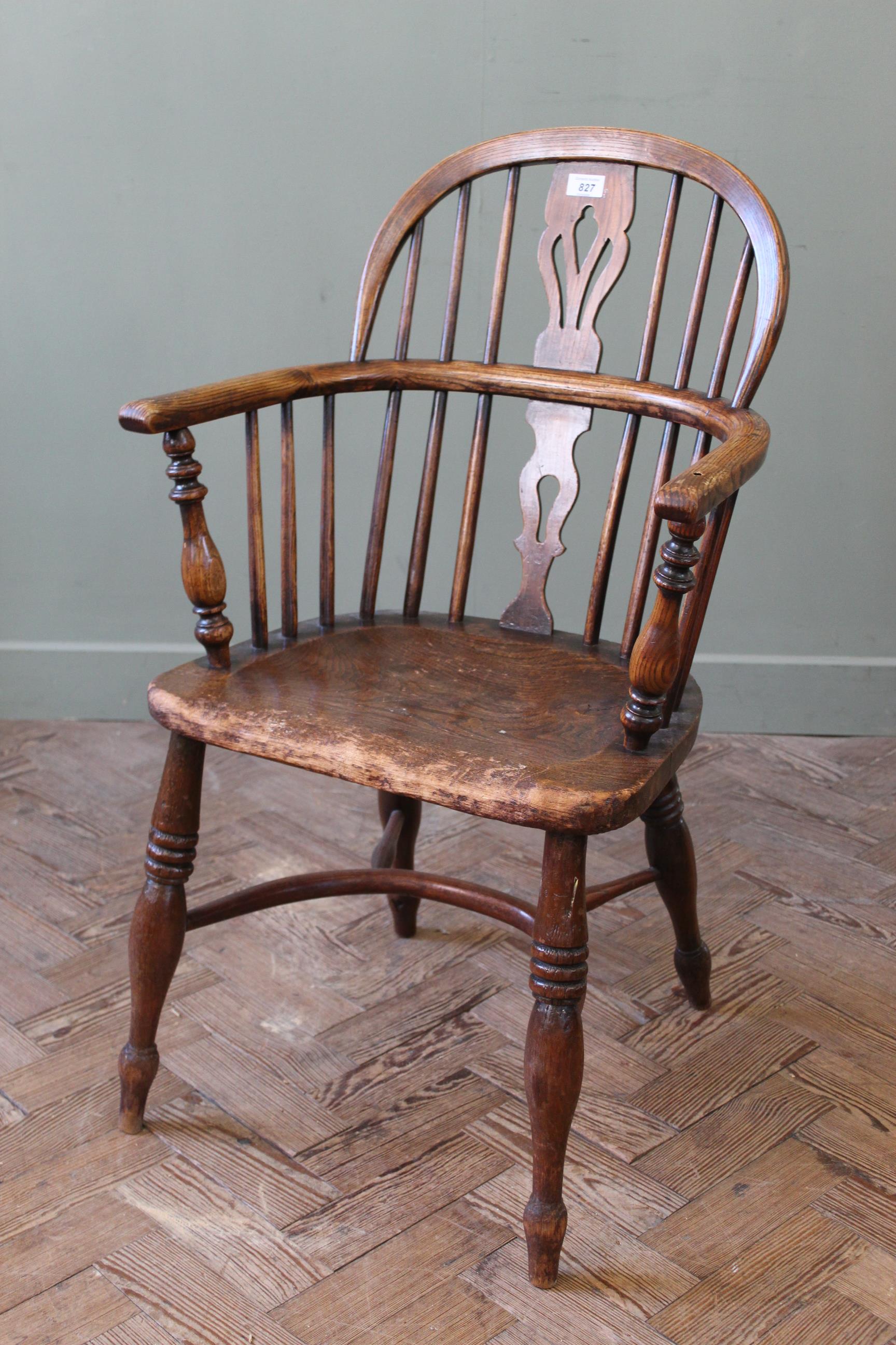 An early 19th Century elm Windsor chair