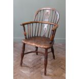 An early 19th Century elm Windsor chair