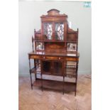 A good quality Edwardian two part rosewood cabinet