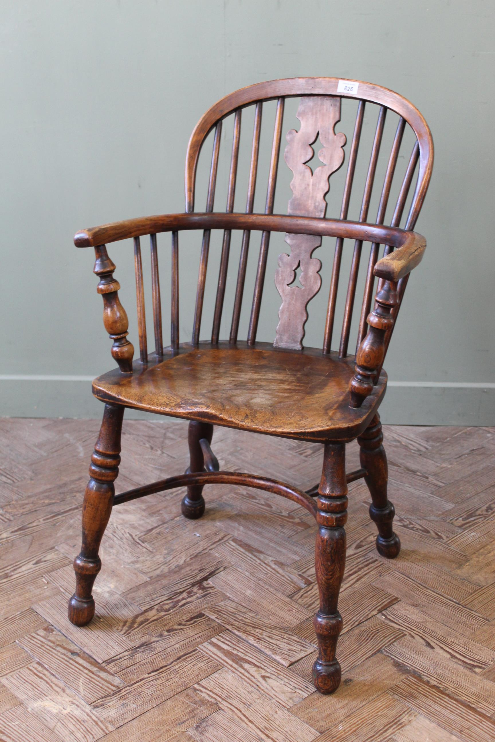 An early 19th Century elm Windsor chair