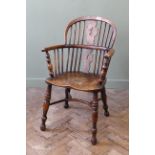 An early 19th Century elm Windsor chair