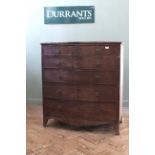 A Regency mahogany six drawer chest with inlay skirt and original handles on splayed feet (top as