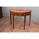 A George III inlaid mahogany card table