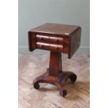 A William IV mahogany two drawer work table with drop leaves,