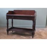 A Victorian mahogany washstand with under tier