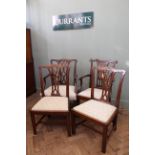 A pair of late 19th Century mahogany dining chairs and a carver with an early 19th Century mahogany