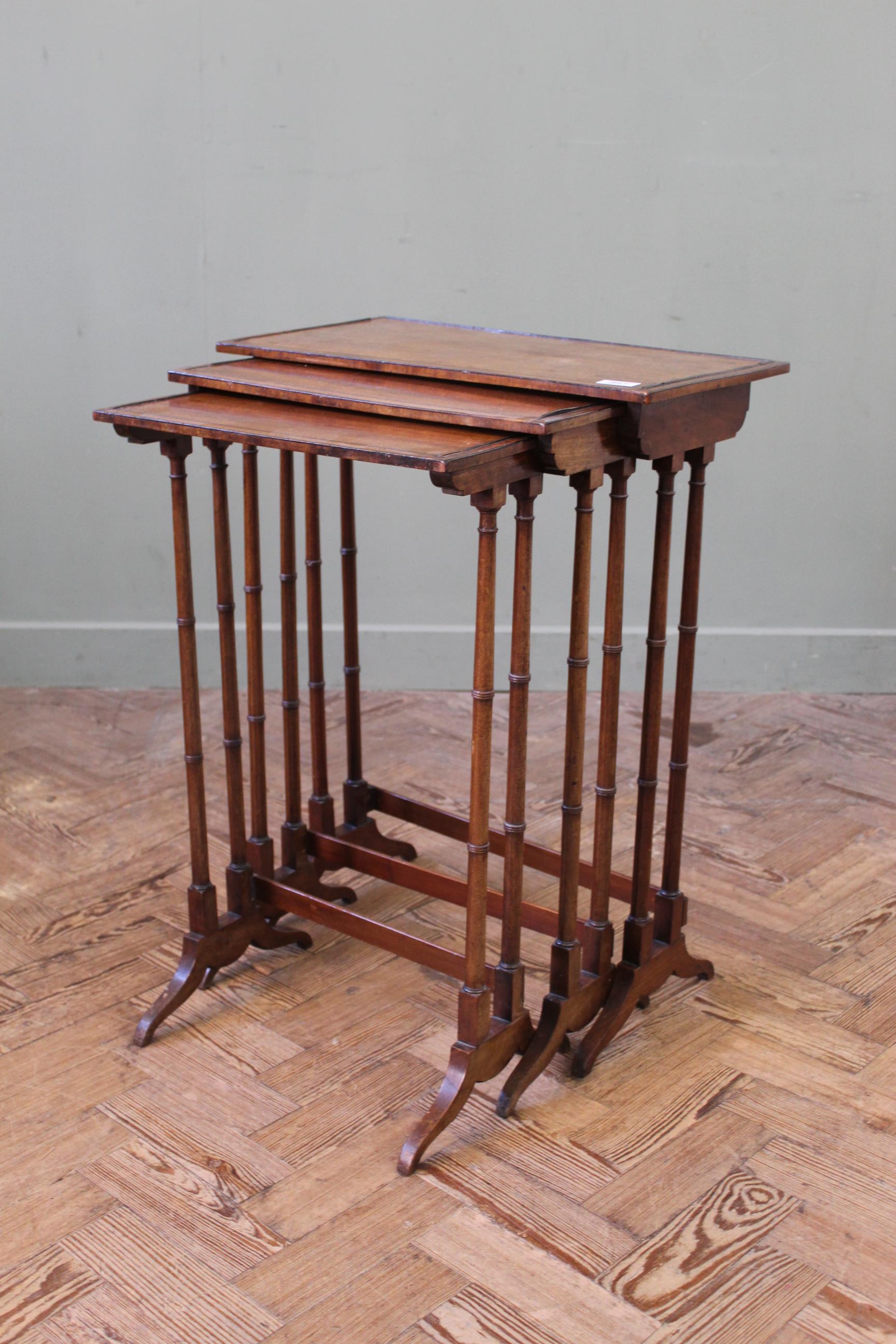 An early 19th Century nest of mahogany tables