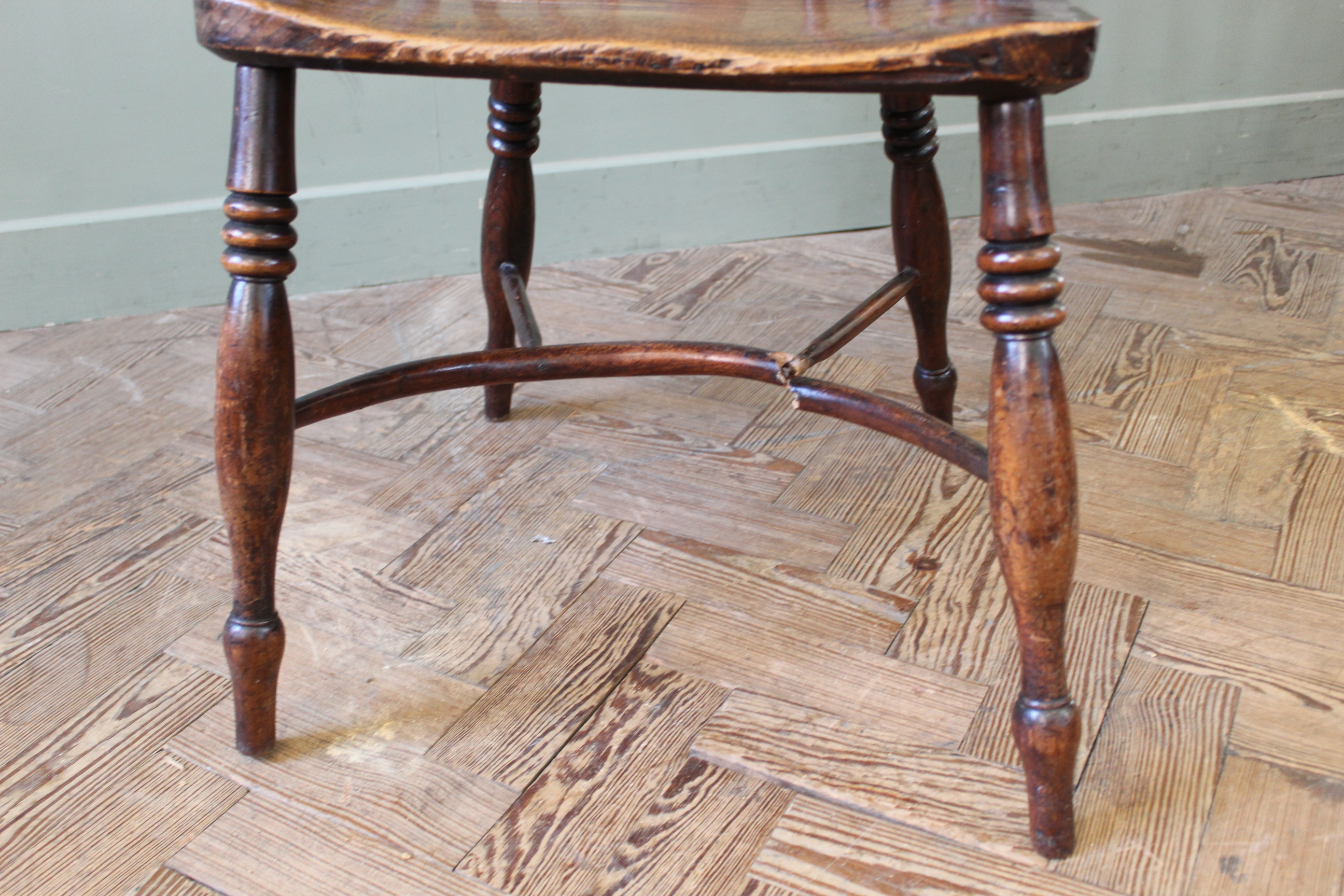 An early 19th century yew and elm Windsor chair stamped 'F. - Image 5 of 6