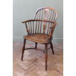 An early 19th century yew and elm Windsor chair stamped 'F.