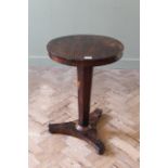 A 19th Century rosewood wine table on squat bun feet (top as found)