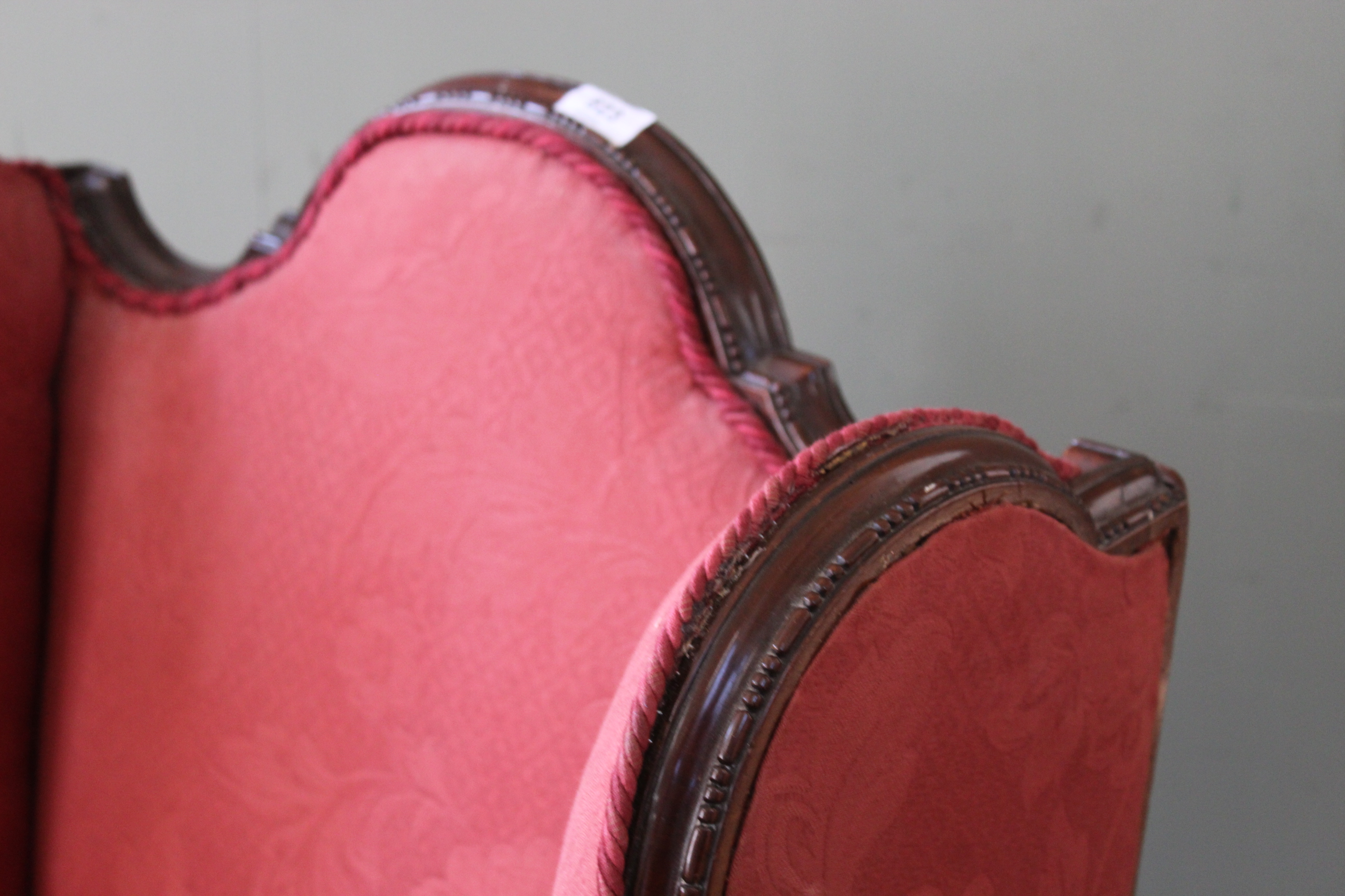 An early 20th Century mahogany Victorian style wing back chair - Image 4 of 6