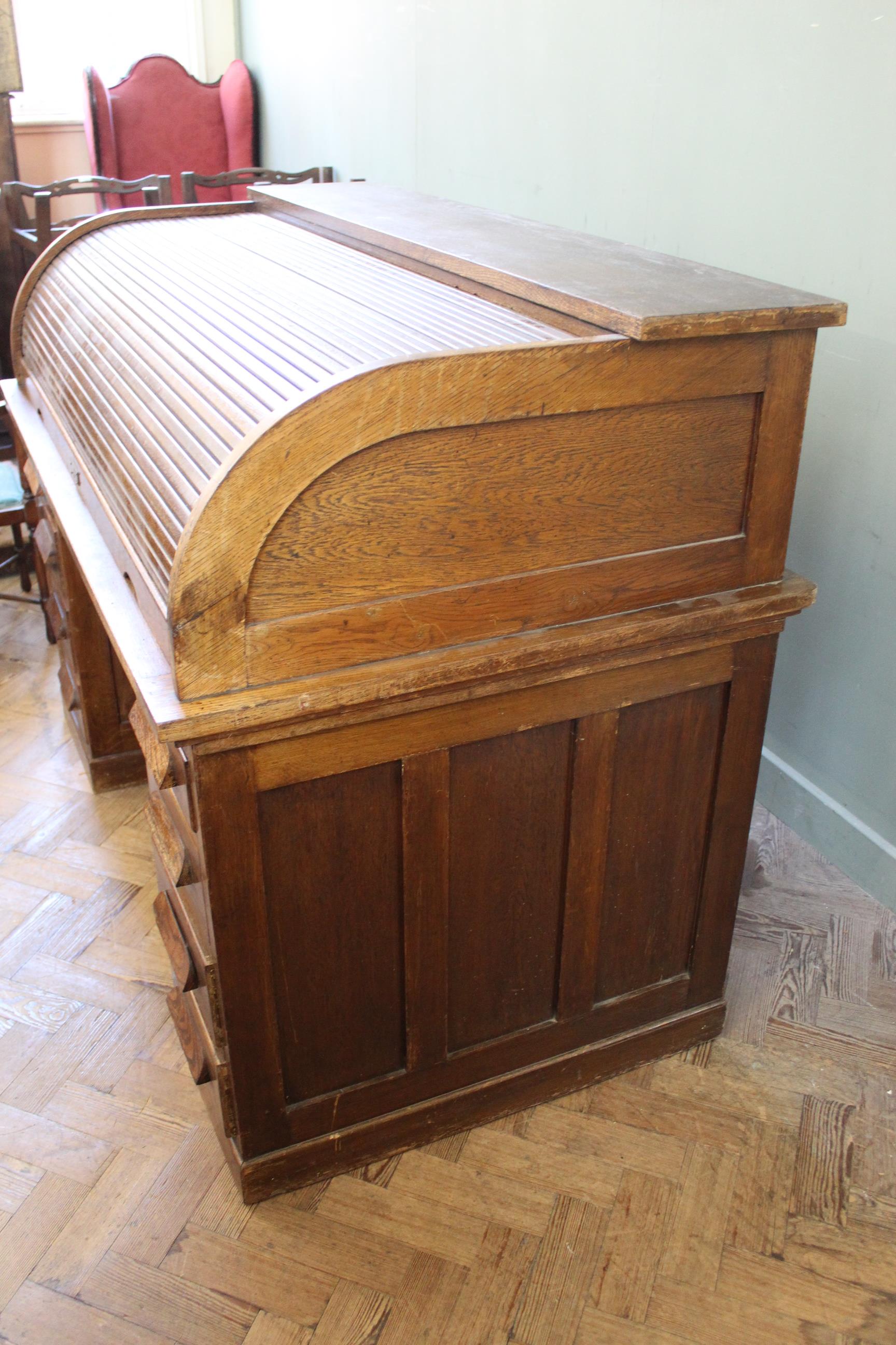 A substantial 1930's oak roll top desk with centre drawer (as found) - Image 2 of 5