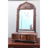 An early 19th Century mahogany toilet mirror,