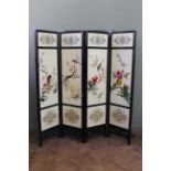 An early 20th Century Japanese four fold ebonised screen,