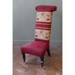 A late Victorian embroidered prie dieu chair