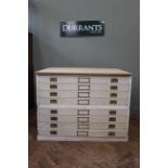 A 1930's painted pine chest in two parts with replaced top