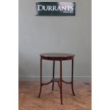 An Edwardian inlaid mahogany occasional table