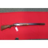 A Baikal O/U B/L/E shotgun with two sets barrels, 29 1/2" (3/4 and full),