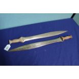 A pair of 'Luristan' style short swords with bronze blades