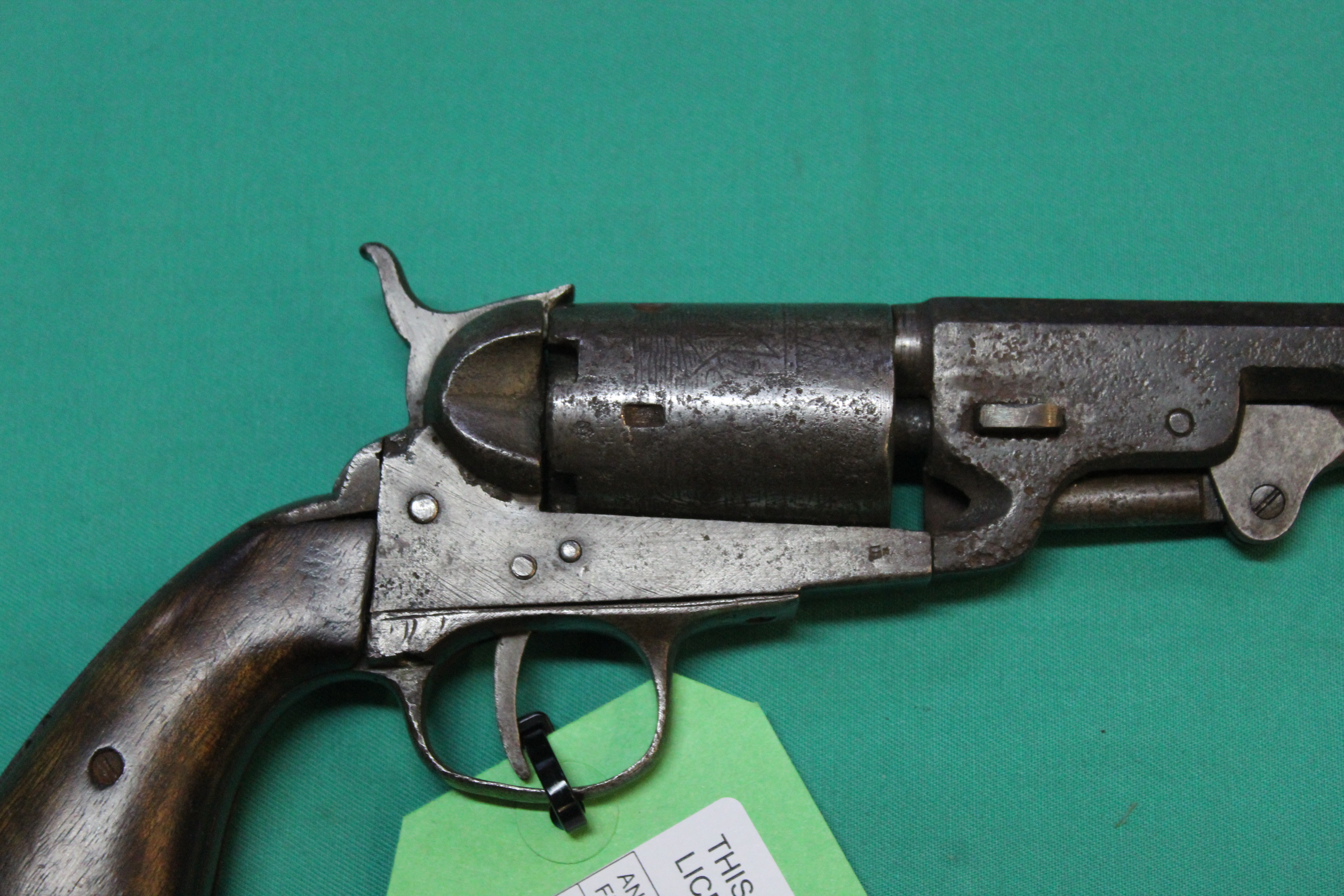 A 'Colt style' five shot pocket percussion revolver of approx .36" bore with a 5 1/2" barrel (N.B. - Image 2 of 3