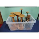 A box containing hat display stands,
