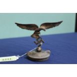 A German eagle above swastika, car mascot mounted on a radiator cap,