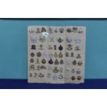 A good collection of fifty eight British military badges (majority being cap badges)