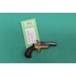 A Colt third model Derringer in .41" rim fire, S/No.