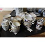 A large selection of late 18th and early 19th Century tea bowls with saucers and decorative cups