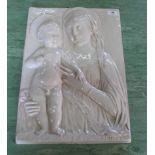 A 20th Century glazed terracotta wall plaque of Madonna and child