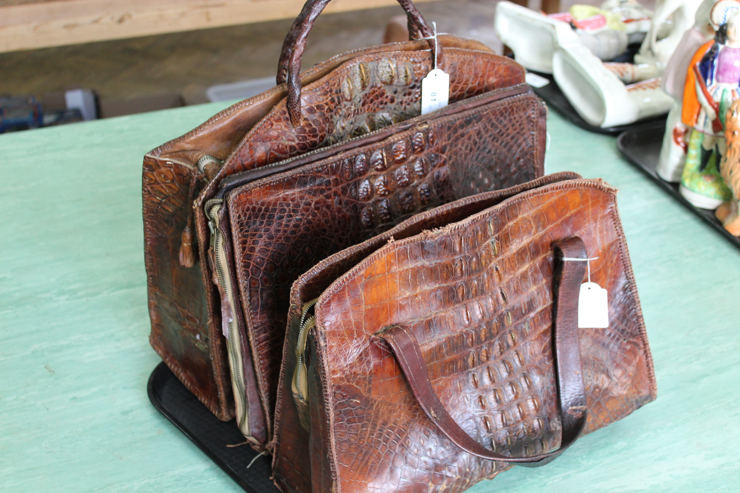 Three vintage mid Century crocodile skin bags, two handbags and one document case,
