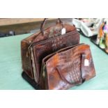 Three vintage mid Century crocodile skin bags, two handbags and one document case,