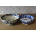 A large pearlware blue and white bowl decorated in the Chinese manner,