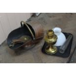 A copper coal scuttle,