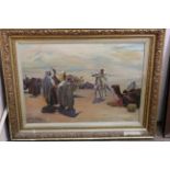 A large gilt framed oil on canvas of an Arabian scene with signature J Paterson,