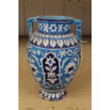 An early blue pottery vase (very damaged)