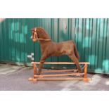 A vintage style fabric rocking horse