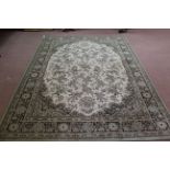 A cream and green floral rug,