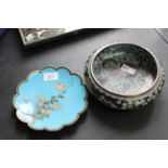 A Chinese cloisonne bowl with dragon decoration and a petal shaped cloisonne dish on blue ground