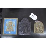 A Russian enamel icon plus a bronze and a brass example