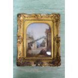 A 19th Century oil on board of a mountain village scene with figures, in a swept gilt frame,