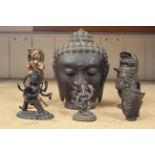 A collection of six mainly bronze Indian figures,